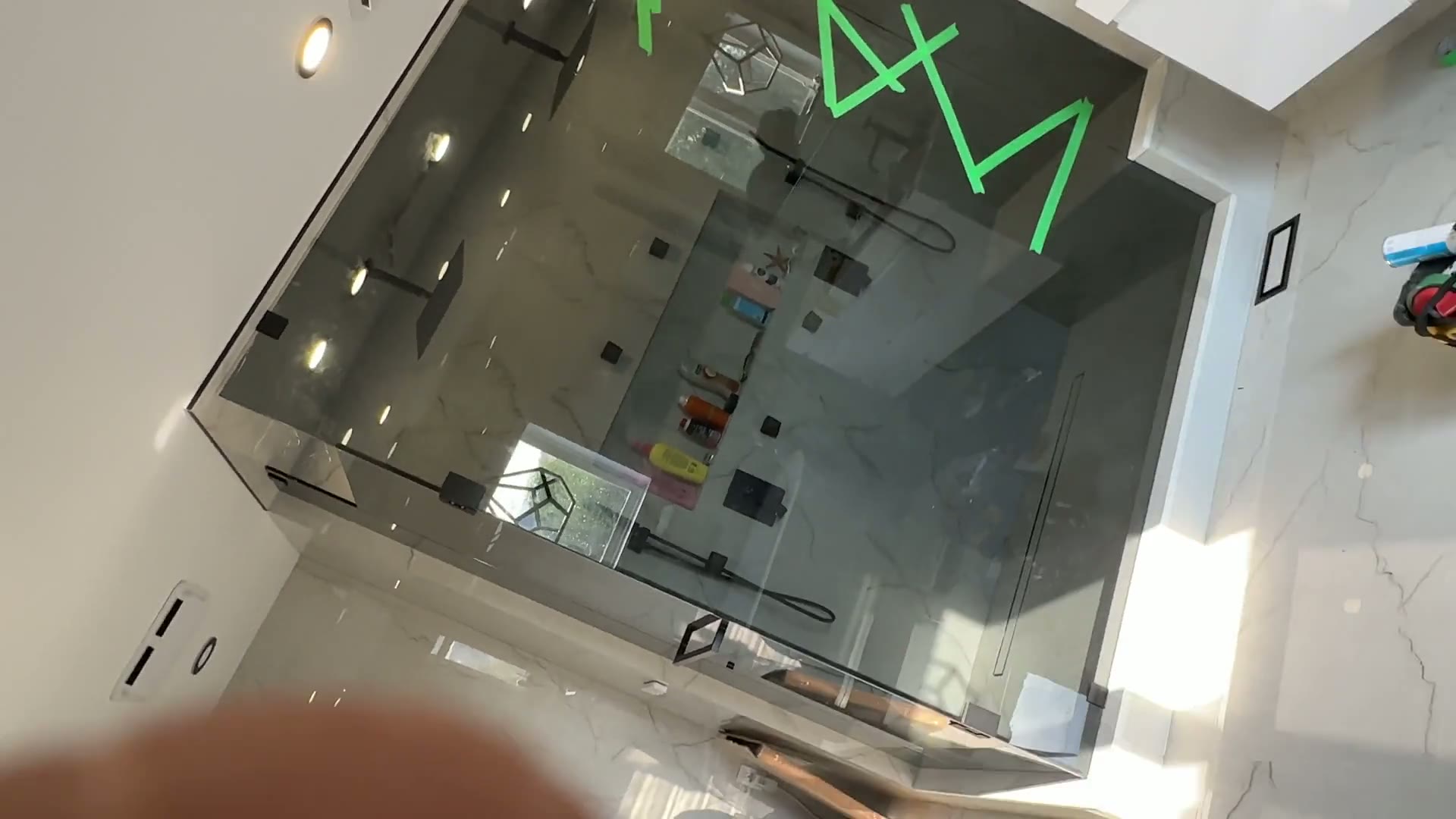 Frontal view of the steam-shower glass door and fixed panels