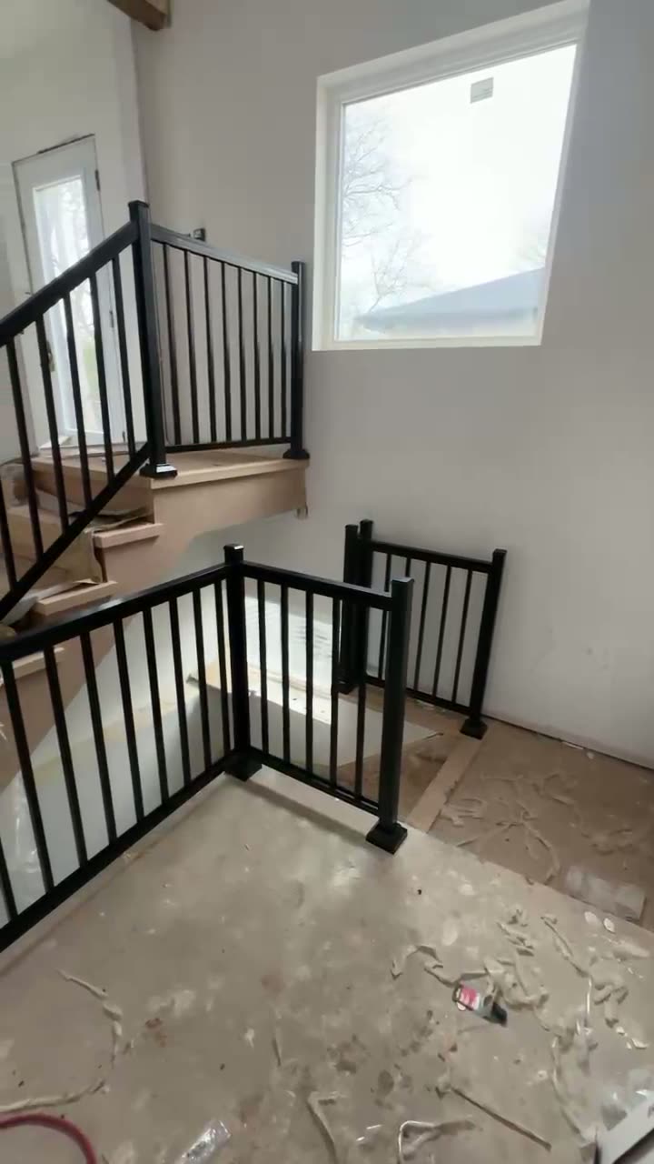 Landing guard with glass infill and black posts