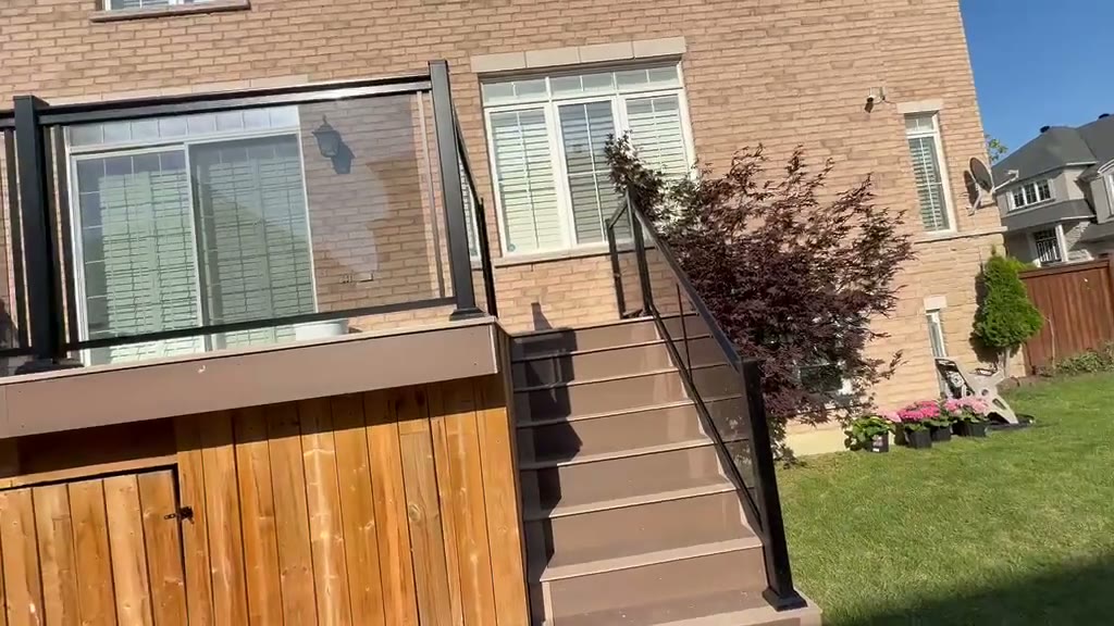 Glass railing along the deck perimeter